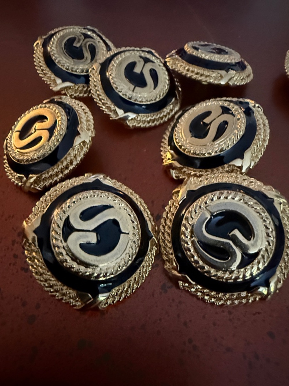 Heavy designer buttons yellow metal and black enamel